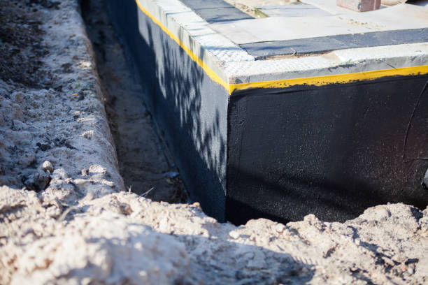 Professional Waterproofing technician working in Jackson, WI